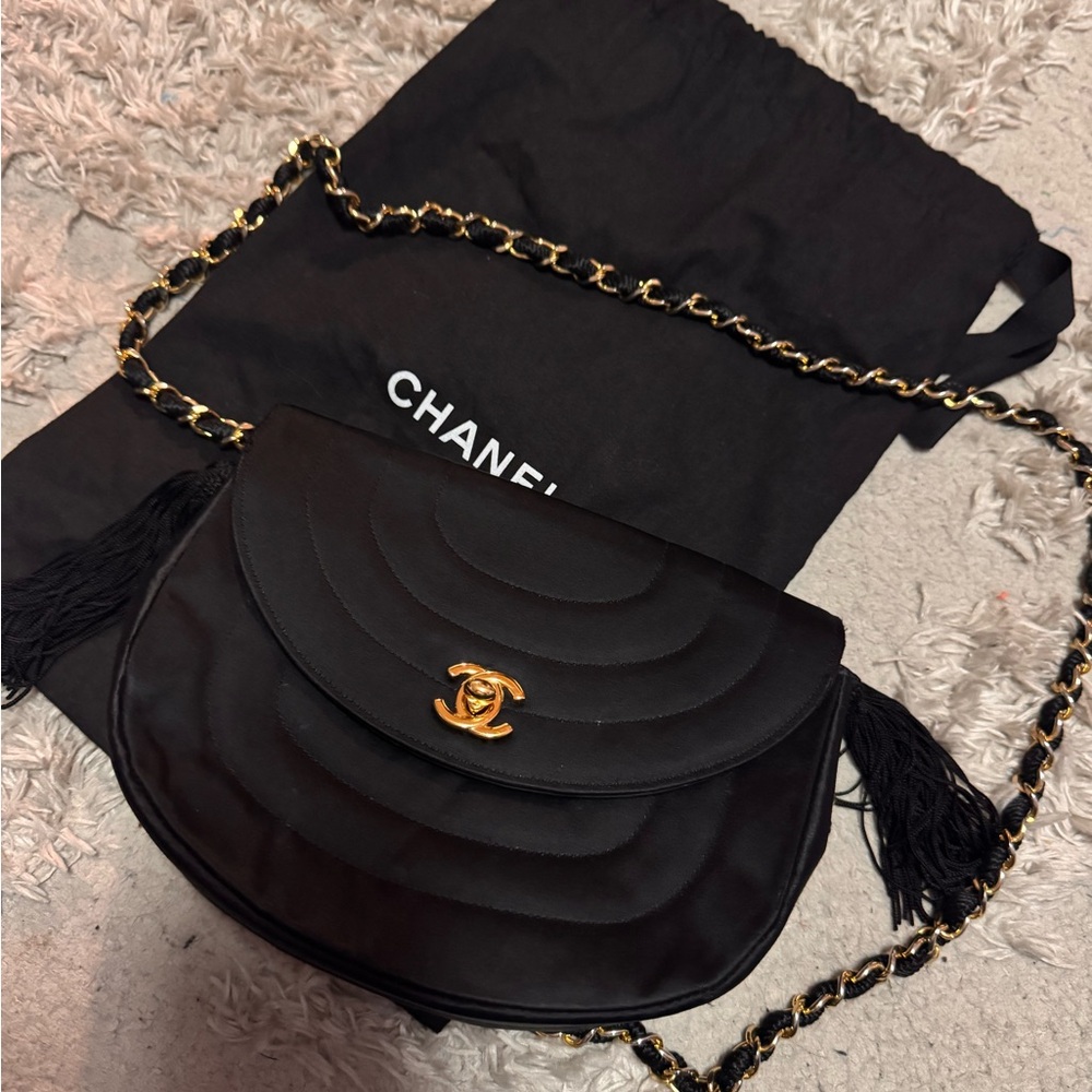 CHANEL Black and Gold Quilted Crossbody Bag